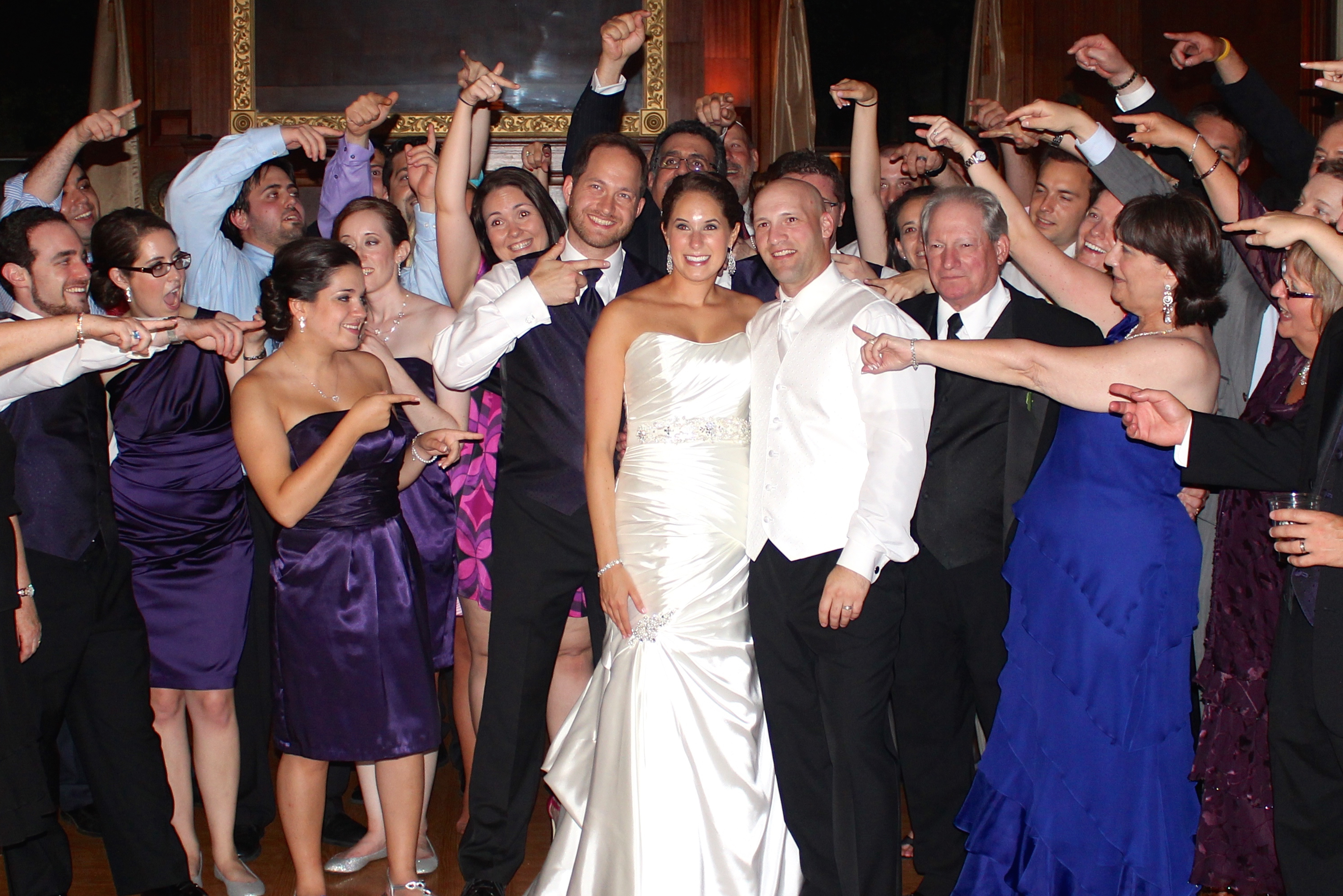 Wedding-bride-and-groom-with-friends-waving-goodbye-baltimore-wedding-dj